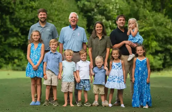 Family portrait outdoors, as featured on the existing Bath Fitter websites