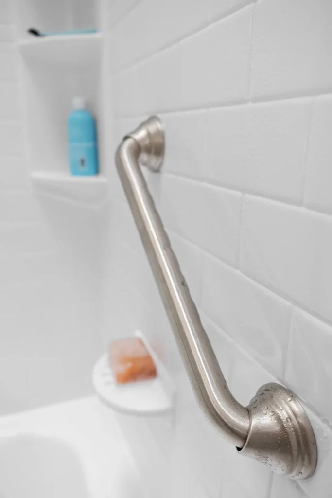 Angled grab bar — Plan support where it is useful in your daily routine.
