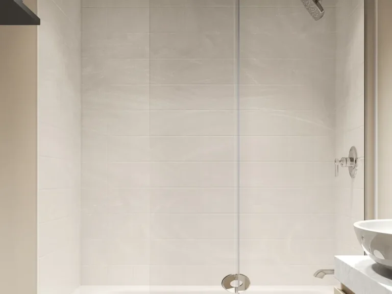 Palermo · White Marble — A marble-look surround shown above a bathtub.