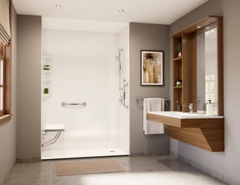White shower with a built-in seat, grab bar and handheld showerhead.